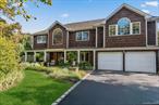 Located in the renowned Three Village School District, this 3, 800 sq. ft. home sits on a quiet street and offers a well designed layout with plenty of space inside and out. The two-story entryway opens to the main level and includes a formal dining room, living room, first-floor laundry, and a full bathroom. Upstairs are four bedrooms, two additional full bathrooms, and a large bonus room offering excellent flex space. The primary en-suite features a gas fireplace, large walk-in closet, and a private entrance overlooking the backyard. In total, the home offers three fireplaces, two propane and one wood-burning. Outdoors, the property includes an in-ground pool, hot tub, pavilion, patio, and mature landscaping. Recent updates include a partial new roof, a new air handler for central air, a new pool liner, coping, and repointed stonework. There is an additional flexible living area with its own private entrance and staircase which provides an option for extended family use, making this property a rare combination of size, updates, and location within Three Village. Unmatched pride of ownership! Close proximity to SBU, Hospital, LIRR, Shopping, Public Transportation, Hospitals, and so much more!