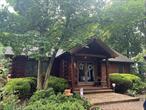 THIS IS YOUR OPPORTUNITY TO OWN A BEAUTIFUL CUSTOM BUILT SALT BOX STYLE LOG HOME! This Well Maintained, Beautiful 3 Bedroom, 2 Full Bath Home has numerous Surprising Features such as 8 Foot Basement Ceiling, Outside Entrance to Basement, a Detached THREE (3) Car Garage, Large Driveway (that has held over 8 cars!), a Dog Run and a 2nd Floor Loft Area that can be used as a Reading Nook, TV Room or Gaming Room, whatever You would like! This Home has a Welcoming Front Porch, You step into a Spacious Foyer with Closets and Continue into the Open Concept Main Living Area with a Gas Fireplace, the Kitchen Boast a Viking Range and Oven and Stainless Steel Appliances. From the Kitchen Step into the Backyard where You will Find a Patio, TREX Deck and Lovely Green Space. There are also 2 Bedrooms and a Full Bath on the Main Level. The 2nd Floor Loft Main Bedroom has a Private Full Bathroom and Walk in Closet (this closet can be a 4th bedroom if desired). The Basement Level has a Finished Separate Laundry Room with Storage Closet. The Full Unfinished Area of the Basement has a Separate Outside Entrance and 8 Foot Ceilings as stated earlier. This home is mid-block and set back from the street. Close proximity to All!