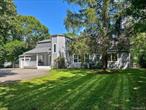 Convenient to the Hamptons, and North Fork. This very private, refreshed contemporary boasts two beautifully landscaped acres, new roof, new hot water heater, a spa, a heated pool with new pool liner and new pool mechanicals. Plenty of decking to entertain. The open concept main level features two guest bedrooms, two full bathrooms, kitchen, living room with fireplace and den with fireplace. The second level features the primary en-suite with walk-in closets, balcony and skylight. The lower level features a media lounge. Located in Southampton Town with access to Town Beaches. Be in for The New Year!