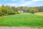 Minisink Valley School District .Charming 3-bedroom, 3-bath home nestled on a cul-de-sac in a great neighborhood, offering inviting curb appeal and spectacular mountain views that frame each sunset. The front porch welcomes you with a warm, scenic preview of the homeâ€™s charm. Inside, youâ€™ll find a comfortable layout featuring a living room with hardwood floors and a cozy fireplace, seamlessly open to the dining room for easy entertaining. The dining area flows into a beautifully updated kitchen, where a breakfast bar island, granite countertops, and a gas stove combine style with practicality. A large family room provides additional living space for gatherings or relaxation. The primary suite is a retreat with two closets and a private bathroom, while two additional bedrooms share full baths, ensuring convenience and privacy. Practical extras include a fenced yard with a deck and patio, hot tub, perfect for outdoor enjoyment, and a two-car garage for parking and storage. This home sits in a wonderful neighborhood with outstanding mountain views, offering tranquil sunsets and a lifestyle that blends comfort with natural beauty. You do NOT want to miss this one! Minisink Valley School District