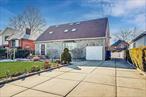 This rare gem sits on a 60x110 lot and offers over 3, 600 sq. ft. of living space. The home boasts 5 bedrooms and 4.5 baths, including two master suites for ultimate comfort and flexibility. Inside, youâ€™ll find a spacious eat-in kitchen, a formal dining room, and a bright, open layout enhanced by 8 skylights that fill the home with natural light. The full finished basement with a bar is perfect for entertaining, while the heated garage, long 10-car driveway, and additional 1-car garage provide ample parking and convenience. Step outside to enjoy a large backyard ideal for gatherings, play, or peaceful relaxation. A truly special property that combines space, comfort, and lifestyle - a rare find in Whitestone Woods! Make your best offer!
