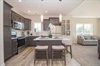 Gorgeous 2 bed 2 bath unit. Second floor unit with a loft. Quartz counter tops stainless appliances. Washer/dryer in unit and a beautiful community room with outdoor patio.