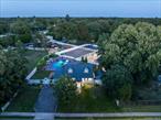 A Horse Lover&rsquo;s Paradise with Endless CharmWelcome to your dream home in the heart of Bohemia! This stunning 4-bedroom Cape is more than just a house; it&rsquo;s a lifestyle. Situated on a serene, picturesque horse property.Step inside to a completely updated kitchen, a chef&rsquo;s delight featuring top-of-the-line appliances, sleek countertops, and custom cabinetry. The open layout is perfect for entertaining, with a seamless flow into the sun-drenched living areas. The home&rsquo;s four bedrooms provide ample space for family and guests.But the real magic lies outside. Imagine spending your summers lounging by the sparkling in-ground pool, or hosting unforgettable barbecues in your incredible outdoor kitchen. This al fresco cooking space makes entertaining a breeze! For those with a passion for horses, this property is a true gem. A classic barn stands ready for your equestrian needs, and direct access to bridal paths means you can saddle up and explore the beautiful local trails.A one-car garage provides convenient storage and protection for your vehicle. This unique property is a rare find, combining exceptional outdoor amenities with a beautifully renovated interior.