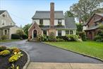 Welcome to this charming Tudor style home, in the heart of East Williston, offering 3 bedrooms and 1.5 baths in pristine, move in ready condition. The inviting living room features a cozy fireplace and sun-filled sunroom, while the beautiful kitchen with breakfast bar flows seamlessly into a dining and living spaces. Hardwood floors run throughout the home, adding warmth and elegance. Upstairs you&rsquo;ll find three generously sized bedrooms and a full bath. Outdoor entertaining is a breeze with a private cozy patio-perfect for relaxing or hosting.