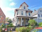 Location ! Location ! Large Detached Colonial With 40x100 Lot (R4 Zoning) In The Most Desirable, Convenient To Everything Section Of Elmhurst, Closed to Broadway. ** HOUSE SOLD AS IS CONDITION ** HANDYMAN SPECIAL **