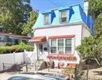 Is a six bedroom and two bathroom house. Is presently being used by two families. As it does have two kitchens.