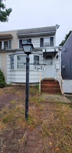 Location Location. Bayside Semi-detached Home. 3 Spacious bedrooms 1.5 bathrooms. Bonus room for den or office Quiet street. Full unfinished basement, Gas heat and hot water tank. Tons of potential with this house. School district 26.