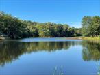 Own your own Lake on the edge of the Catskills. 26 acre bass pond for sale, assemblage of 12 lots surrounding and including Pine Bush Lake. Just West of the Hamlet of Pine Bush, this package includes 3 of these 12 lots which attained septic design approvals in 2013 and 2016, great percs here. Approvals need re-application. Dam retaining lake has been recently rebuilt to NYSDEC specs and approved. Full survey and 3 expired septic approvals attached as documents to this listing. Total package about 33 acres.