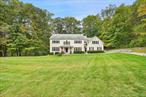 The Perfect Country Colonial. Peaceful setting at the end of a desirable cul-de-sac. Nearly three serene acres with level lawns, flowering plantings, stone walls and towering trees. Fabulous rear terrace with firepit, built-in barbecue and fridge for fun outdoor entertaining. Absolutely turn-key Colonial with light and airy rooms. Stunning interior with great circular flow, high ceilings and beautiful hardwood floors in a dark stain. Dramatic Two-Story Entrance Hall. Formal Living and Dining Rooms. Private Office ideal for working remotely. Chefâ€™s Kitchen open to Family Room with soaring ceiling and gas fireplace. Four Bedrooms including private Primary Suite. Luxurious new Baths. Second Floor Bonus Room with infinite possibilities. Walkout Lower Level. Great Storage. John Jay Schools. An incredible offering!