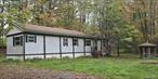 Single wide situated on a lovely 3 + acres in kenoza lake, close to the hamlet of jeffersonville. Nice country road to call home. Mobile needs work or you can remove and replace. The land is mostly flat, with mobile situated back from the road for privacy. Wooded towards rear giveing a great view. This could be well worth the effort for affordable housing.