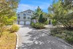 Experience coastal living in this breathtaking 3 level contemporary style home, perfectly positioned on a private Cul-De-Sac in The Incorporated Village of Asharoken, just steps from its own deeded beach.Designed for both grand entertainment and intimate relaxation, this 5-bedroom, 4.5-bathroom home offers ample space for multigenerational living.The main floor features a living/dining area with wood burning fireplace, 2 primary bedrooms each with en-suite, 2 additional bedrooms, bathroom, laundry room with half bath, and an eat-in kitchen with quartz countertops and sliders to an entertainment deck.This floor also boasts a dramatic great room with 18-foot ceilings, gas fireplace and stairs leading to a 3rd floor office with outside deck and water views.The lower ground level has additional living space, a bedroom/office, bathroom and exercise/playroom.Amenities include: 3 1/2 car garage with wide entry doors, CVAC, 6 zone gas baseboard heating, 2 zone CAC, hardwood, tile and terracotta flooring throughout, skylights and ceiling fans.Interior Features: Cathedral Ceilings, Ceiling Fans, Central Vac, Eat-In Kitchen      Quartz Countertops, Washer, Dryer, Electric Cooktop, Double Electric      Oven, Dishwasher, Refrigerator, Wood, Ceramic and Terracotta FloorsSection three:      RoomsGround Level:     Entry Foyer, Family Room with 8 Foot Sliders to Patio,          Bedroom/Office, Playroom/Den                 Main Level:     Living/Dining Room with Wood Burning Fireplace, Eat-in Kitchen,                  2 Primary Bedrooms with En-Suites, 2 Additional Bedrooms with Hall    Bathroom, Family Room with 2-Sided Fireplace to outdoor Patio, Laundry Room with Half Bath                            Upper Level:       Loft/Office with Deck Leading to Deck with Views of Li SoundUtilities:           Gas Heating (6 zones), Gas Hot water heater, 200 AMP electric, Solar panels,  Septic System, Public Water