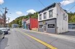 Rare opportunity to own a mixed-use property in the heart of Rosendale! 424 Main Street features a beautifully renovated ground-floor commercial spaceâ€”Currently home to Lift Cafe, and formerly home to Perry&rsquo;s Picklesâ€”along with a stunning two bedroom, one-and-a-half bath apartment upstairs. The commercial space offers great visibility, foot traffic, and flexible use potential, whether for retail, caf&#233;, or restaurant with possible garden seating. A full basement with walk-in provides ample storage and utility space, while the rear lot offers 6 convenient off-street parking and potential expansion. 6, 065 Annual Average Daily Traffic (reported by DOT). The upstairs apartment is a light-filled gem with hardwood floors, modern finishes, and tasteful updates. A welcoming living area opens into a functional kitchen, with a half bath near the entry and a full bath near the two spacious bedrooms. The unit is currently leased and generating income, making it an excellent way to offset ownership expenses. Perfectly located just steps from the Rosendale Trestle, Rondout Creek, and the Wallkill Valley Rail Trail, this property combines character, flexibility, and income potential. Whether you&rsquo;re an investor, entrepreneur, or buyer seeking a live/work opportunity, 424 Main Street offers a rare chance to be part of one of the Hudson Valley&rsquo;s most vibrant and historic communities.