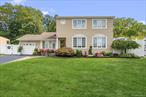 Welcome home to 939 Manor Lane in Bay Shore. This meticulously maintained 4-bedroom, 2.5-bath Split Style home offers both comfort and modern design.The heart of the home is the designer, custom oversized kitchen renovated 2022 featuring a stunning Cambria quartz waterfall island with microwave drawer, European Style cabinetry with pantry pull-outs, under cabinet lighting,  porcelain plank tile and stainless appliancesâ€”making it a true entertainer&rsquo;s kitchen. Radiant heat runs throughout the entire main floor adding warmth and comfort underfoot. The oversized kitchen flows seamlessly into the living room, where soaring ceilings that creates an open and airy layout. An Anderson slider opens to a spacious Trex deck, perfect for outdoor dining.Step down to a lovely den with a custom granite window ledge and a tiled bathroom. For added convenience, a private laundry room with a new washer and dryer offers extra storage.Additional notable features include a 3-zone new heating system, separate new hot water heater, 200-amp electric service, a generator connection box/transfer switch for a portable or home generator for peace of mind, ductless air conditioning, central air, an in-ground sprinkler system, security camera system, and waterproof LVP flooring.The backyard is an entertainerâ€™s delight, showcasing an 18 x 36 heated L-shaped inground pool w new liner, new heater & solar cover, surrounded by brick pavers, a screened-in gazebo with electric for shaded relaxation, and a dedicated play area with a wood kingdom playset. This is the perfect home for both relaxation and entertaining.