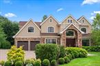 Welcome to 11 Buckingham Ct â€” an exceptional Colonial-style residence in the prestigious gated community of Stone Hill, Muttontown. This one-of-a-kind, custom-built young home offers approximately 5, 500 sq. ft. of refined living space, seamlessly blending timeless architecture with modern luxury. The impressive entry sets the tone for this elegant yet inviting residence. Step inside through the grand mahogany double doors to a soaring two-story foyer with a graceful bridal staircase. The homeâ€™s elegance unfolds with imported granite floors, radiant heat throughout the main level, coffered ceilings, exquisite moldings, and finely crafted millwork. The impressive double-height living room is a showstopper, featuring a majestic fireplace, dazzling chandelier, and French doors that open to a serene patio. A true gourmet will fall in love with the chefâ€™s kitchen, designed with custom artistic cabinetry, imported countertops, high-end appliances, a large center island, and abundant natural light. A rare second kitchen with extensive storage / sink / dishwasher adds to the homeâ€™s thoughtful design. For seamless entertaining, a sophisticated butlerâ€™s pantry connects the kitchen to the formal dining room. The first-floor grand primary suite is a retreat in itself, complete with a private sitting room/office, a lavish primary bath with dual facilities, and a separate laundry room. Also on the main level is a second ensuite bedroomâ€”ideal for guests or in-law. An elevator services all levels, including the second floor, which is as functional as it is stunning. Here youâ€™ll find four additional ensuite bedrooms, an office, a gym, a full bath, a second laundry room, and two spacious finished walk-in attics. The partially finished basement offers an incredible 3, 000 sq. ft. of open space with soaring 10-foot ceilings and a walkout entranceâ€”ready to be customized to your lifestyle. Outside, the park-like half-acre property blooms year-round with flowers and trees, providing a private, tranquil backdrop. The home is equipped with advanced features including 7-zone radiant and HVAC heating (with instant hot water), Marvin windows, an architectural roof, central vacuum, and a whole-house water filtration / water solften systemâ€”all ensuring comfort and efficiency. Stone Hill offers premier community amenities, including an indoor heated pool, tennis courts, gym and clubhouse, all within the award-winning Syosset School District. 11 Buckingham Ct isnâ€™t just a homeâ€”itâ€™s a statement of luxury living.