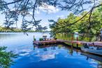 A unique opportunity to buy into Private boating and fishing Club with only 100 members, the club owns 446 acres including Pleasure lake along with private trails for hiking and biking use along with undisturbed fields land. Enjoy sunsets from your dock at Lot 51 a 2 bedroom, plus a bonus loft 2 full bathroom, finished walk out basement,  lake front contemporary style home built in 2008. Your share into the club is the actual home. House sits on just shy of half acre of land with parking area that can accommodate 4 vehicles. Wrap around porch to enjoy the lake views along with your own private dock and beach area. Upon entry you will notice the vaulted ceilings with breathtaking views of the lake from kitchen and living room areas, along with sliders out to the deck overlooking the water. Main bedroom and full bathroom on main level. Upstairs offers second bedroom along with loft area that can be used for 3rd sleeping area with amazing views of the lake or a great spot for a home office. Partial finished basement with walkout to the bluestone patio under the deck along with access to dock and outdoor shower. House does have its own individual septic system along with an artisan well, the home is set up for year round use however the club is a 3 season club. Yearly calendar of events including an ice fishing contest in winter months. Private website for members with list of events along with members news. The club is gated with 3 entrances and is truly a unique place. The property is considered a co op and any buyer will have to meet board approval.