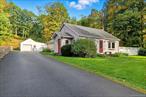 Discover the perfect blend of country charm and modern comfort in this impeccable country retreat. Thoughtful updates and consistent maintenance are evident throughout this home. The interior boasts a large kitchen with central island and dedicated indoor spa room, a true highlight of this inviting residence. Complete with a jacuzzi tub inside a large multi-head shower room (which can be converted to a steam room) and an infrared sauna, all with radiant heat throughout. This private space adds a layer of luxury and relaxation that sets this home apart. A must-see for anyone prioritizing wellness and high-end amenities. The garage has room for one car plus a workshop for what ever your hobby might be. Step outside to a beautifully landscaped yard and a new bluestone patio perfect for entertaining. The back of the property has been cleared in anticipation of a pool but would also make a beautiful orchard or play area for children. The electric has recently been upgraded to underground from the road, no overhead wires to deal with. Enjoy the peace and privacy of rural living without sacrificing convenience. This home has been cherished and is now ready to be a cherished haven for you.