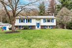 Welcome to this well maintained 3-bedroom, 2-bath raised ranch. NEW ROOF, SEPTIC FIELDS AND DISTRIBUTION BOX just installed 9/25. Ideally located on a quiet street within the desirable Arlington School Districtâ€”just one mile from the Taconic State Parkway. Set on a private, level 1-acre lot, this home offers the perfect blend of comfort, functionality, and outdoor enjoyment. The sun-drenched main level features hardwood floors and an open-concept layout that seamlessly connects the spacious living and dining areas. The eat-in kitchen offers plenty of room for casual meals and easy entertaining. Step through the sliding glass doors into the inviting 3-season sunroomâ€”an ideal spot to relax with morning coffee or host guests in any season. From the sunroom, walk out onto the expansive deck, perfect for summer grilling while enjoying views of the large, level backyardâ€”ideal for outdoor play, or even a future in-ground pool. Three generous bedrooms and a full bath, along with central A/C, complete the main level. The lower level offers even more living space with a large family room featuring brand-new flooring, a second full bath, and convenient access to the 2-car garage. All this and just minutes from shopping, dining, and the Dutchess Rail Trail. Donâ€™t miss this opportunity to own a move-in ready home in a prime location!