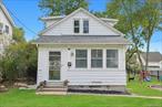 Charming cottage in the hamlet of Tappan featuring a window-lined enclosed front porch and a warm and inviting open floor plan. The bright and sunny rooms flow seamlessly from living to dining rooms and into the kitchen which walks out to the rear deck. The kitchen was recently renovated with full-height cabinets, center island, and stainless appliances (2022). There are hardwood floors throughout, some with a vinyl floating floor covering. With the recent additions of the enclosed front porch and the studio out back, the home has usable space of approximately 1, 195sf. Additional updates include new electric panel (2022), three ductless a/c units (2022), washer and dryer (2021), sump pump and french drains in the waterproofed basement (2021), 240v electric vehicle outlet, roof approximately 7-10 years old, and a fully fenced backyard (2022). Tappan is a historic community, with sites dating back to the Revolutionary War, including the Old &rsquo;76 House tavern and the DeWint House, where George Washington had his military quarters. Located just 15 miles from the GWB, and with Coach buses nearby, commuting to NYC is a breeze.