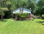 Looking for a quaint cabin with tons of potential? Look no further. Located just 20 minutes from major stores, Catskill Resorts Casino and the highway, this weekend getaway home sits on a total of 7.7 beautiful acres. The property also features a pond, dedicated space for a garden and has an abandoned in ground pool, as well as an additional dwelling (condition of pool and dwelling unknown) on the property. Being sold AS IS. Cash is preferred, mortgages will be hard to obtain.