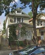Opportunity knocks! Located in the heart of East Elmhurst, NY, this 3-bedroom, 1-family home sits on a 24x122 lot and offers great potential for customization and value-add. The property features a private driveway with 2-car parking, ample outdoor space, and a full lower-level for additional storage. This property offers a blank canvas for upgrades and personal touches, making it an ideal choice for buyers with a vision. Enjoy the convenience of being just minutes from LaGuardia Airport, major highways, schools, parks, and local shopping