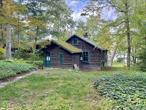 Opportunity for direct waterfront!!! Come see this cabin that is situated directly on the shoreline of Lake Waccabuc in quiet lake community. The structure itself is built primarily of beautiful wood siding and features a wood burning stove with a stone and mortar foundation. Large, multi-pane window line facing the water makes for great entertaining or relaxing providing an unobstructed view of the lake. The interior consists of an open-plan living space with exposed wooden beams. The flooring is made with real 3 1/3 x 3/4 hardwood. A compact kitchen is ready for you to put your own personal touches on it. The property includes a gentle, grassy slope that leads down to the water&rsquo;s edge. Mature oak and maple trees offer partial shade along the sides of the clearing, while the view of the lake remains open. The location is in an area characterized by its wooded landscapes and proximity to several reservoirs creates a great environment for a weekend getaways to include hiking boating and other outdoor activities all within a stones throw from NYC. Schedule your tour today as this one will not last long.