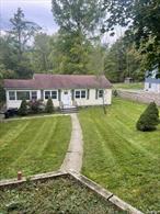 Completely gutted and beautifully renovated interior! Everything is brand new, including electric and plumbing. Features a modern kitchen, a bright sunroom, and a nice backyard with plenty of privacy â€” all on a private road.