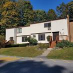 This spacious two level townhouse with full basement walk-out located at The Arbors condo. Freshly painted interiors, hardwood floors in the Living room & Dining room. Eat-in kitchen with built-in seating & storage. Formal Dining Room has sliders to deck. Oversized Primary bedroom with 2 walk-in closets. 2nd bedroom has walk-in closet and single closet. 3rd bedroom has built in bunk bed. Hardwood floors under carpeting in the second floor. Huge basement has recreation room with walk-out sliders to backyard. Bonus room can be computer room or crafts room. Separate walk-in closet for your seasonal closet storage. Large unfinished area for your workshop, exercise room, washer & dryer stays. Monthly HOA includes: heat, hot water, cooking gas, water/sewer, garbage, snow removal, lawn care, reserved parking #32, inground pool, playground, Visitor parking available. Minutes to CIA, Marist, Hospitals, Metro North RR is 3 miles. Why pay rent when better to own? Come & take a look.