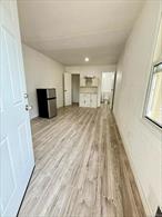 Newly renovated studio apartment for rent. New bathroom with full closet. Included is fridge and kitchen island with electric cooktop for cooking. Street parking. Backyard access. No pets and no smoking. All utilities included.