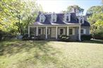 4+ Acres of Horse Country! Charming Dutch Colonial Peacefully Nestled on 4+ Acres of Land- a Fantasy come to Life. The Front Porch Welcomes you and your guests and is the Perfect Place to Relax and enjoy the tranquility. As you enter into the Formal Living room, notice the wood burning fireplace with its original mantle and the large windows. Pass through and into the Formal Dining Room with gas burning fireplace- another beautiful original mantle and custom built-in display cabinet. The Kitchen has plenty of space and windows for natural light. There is a large mudroom with enough space for all. The wood paneled office has built-in shelving to keep everything you need organized. Did I mention the Sunroom? This is the perfect place to cuddle up with a good book, your favorite mug and a cozy blanket surrounded by nature. Head upstairs and you will find the most delightful 3 bedrooms. Thereâ€™s even an unfinished basement with enough storage space and plenty of room for your next project. Conveniently located near shopping, restaurants and transportation. Need more? The Solar Panels are friends with your wallet and the environment. Enjoy a worry-free hurricane season with the Whole House Generator. This Wonderful Home has everything on your wish list!