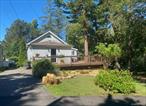 Charming 2 bed, 1 bath ranch in Sound Beach with deeded beach rights via SBPOA to both West & East beaches. Located in Miller Place SD on just under 1/4 acre. Features cathedral ceilings, loft area, wrap-around deck (resurfaced 2020), and full unfinished basement. Kitchen boasts soapstone countertops (2019), propane oven/stovetop, and pot filler faucet. Renovated bathroom (2019) includes heated floors. Pantry/laundry room added in 2021. Energy-efficient upgrades: owned solar panels (2018), mostly Andersen windows, new roof (2024), septic system (2018), new electric panel (2021) with generator plug-in ready. Forced air heat and cozy fireplace. Attached garage for convenience and storage. Move-in ready home offering modern comfort and coastal charm!