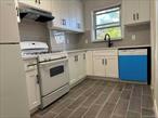 Get this gem like house, be the proud homeowner! Attached brick house in perfect condition. New Kitchen (2025), new deck (2025), new boiler (2025) and newer hot water heater. Roof is also newer, all new windows installed in 2023! Clean Garage and two parking spots on the driveway. Quiet one way street makes this house feel so peaceful. Four bedrooms, three full baths. Top floor bedrooms can be renovated with new floor and new baseboard like the living room if buyer wants. Location: close to major highways, Queens College, play ground, lots of restaurants. Q25 Q17 Q34 one block away. Qualified buyers please bring your preapproval! Please call/text listing agent Xenia Liu for showing.
