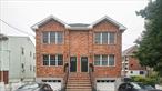 Beautifully built brick residence featuring 3 spacious bedrooms including a primary suite with en-suite bath, an additional full bath, and a convenient half bath on the first floor. This home offers a bright open layout with oversized windows, modern kitchen, comfortable living and dining areas, private driveway parking, laundry, and central heating and cooling. Outdoor living is complete with a back patio and yard, all in a prime location near Cross County shops, restaurants, schools, parks, and public transportation.