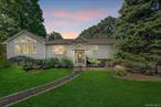 Welcome to 1155 Union Avenue in the Town of Newburgh, where space, comfort, and opportunity come together in one extraordinary property. Set on just under an acre, this expansive home offers nearly 4, 000 sq ft of living space with 5 bedrooms and 4 full bathrooms, thoughtfully designed to accommodate a variety of lifestyles. From the moment you enter, youâ€™re greeted by a sense of warmth and openness, with hardwood floors gleaming underfoot and sunlight pouring through oversized windows.The heart of the home is its great room, added in 2010, where a wall of windows frames views of the front yard and floods the space with natural light. Imagine cozy evenings by the pellet stove, family gatherings that flow seamlessly from the dining room to the great room, or mornings in the designer kitchen with its custom cherry cabinetry, granite counters, and professional-grade appliances. The ownerâ€™s suite sits privately on its own wing, offering a peaceful retreat with a spacious walk-in closet and en-suite bath. On the opposite end of the home sit 3 additional bedrooms with one of the rooms featuring its own private en-suite.This property also includes a legal 1-bedroom, 1-bathroom ADU apartment with its own entrance, mini-split air-conditioners and radiant heated floors. The ADU is a game-changer, offering endless opportunities: multigenerational living where loved ones enjoy independence while staying close, a private space for guests, in-laws, or even a home office.Outdoors, a large backyard provides plenty of space for play, gardening, or entertaining. A deck with a retractable awning extends your living space into the fresh air, while mature landscaping and custom touches like the additional parking spaces and the carport in addition to the custom patio, create a sense of charm and privacy. With a two-car garage, generator hook-up, and thoughtful upgrades throughout, the property blends convenience with peace of mind.Location adds yet another layer of appeal, just minutes from I-87 and I-84 for easy commuting, close to shopping and dining, a short drive to the Hudson River waterfront, and with Beacon Train Station nearby for Metro-North access to New York City.Whether youâ€™re a growing family needing space, an investor seeking an income-producing property, or someone looking for a home that brings loved ones together under one roof while still offering privacy, this property delivers. 1155 Union Avenue is more than a home; itâ€™s a place where possibilities take root.