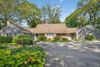 Elegant Expanded Ranch nestled in the heart of Locust Valley is surrounded by exquisite gardens and ivy-covered paths, creating a storybook setting from the moment you arrive. Designed for both comfort and sophistication, the home offers handicap accessibility throughout with one designated bedroom and bathroom fully handicap ready, making it welcoming and functional for all. Inside, the living room showcases a stunning marble-mantled fireplace and overlooks the bluestone terraceâ€”perfect for seamless indoor-outdoor entertaining. Thoughtfully appointed rooms provide the ideal balance between formal and casual living, from the inviting dining room to the spacious family areas that suit everyday life. With its timeless charm, manicured gardens, and versatile layout, this residence offers an exceptional opportunity to enjoy the best of North Shore living in a truly special Locust Valley setting.