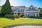 Located in the exclusive True Harbour Community. A short distance to the bay this shy 4000 sqft Center Hall Colonial sits on .6 acres of landscaped privacy on a private cul de sac. Community amenities include private beach, snow removal, security cameras and common area maintenance. This home features 5 bedrooms, 3.5 bathrooms, lounge with bar/formal living room, formal dining room, center island kitchen with dining area, great room with fire place, powder room, laundry room, pantry, guest bedroom and a full bathroom. Upper level of the home includes the primary suite with fireplace, walk in closet, spa bath and walk in shower, two additional bedrooms, huge media room with wet bar and refrigerator. Enjoy the heated salt water free form pool with hot tub and water fall.