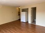 Studio apartment in extremely convenient location. Heat, hot water & electric included. Large space with huge storage closet, wall a/c & abundant natural light. Just minutes from restaurants, shopping, colleges, trains & commuter routes. No pets, no smoking. Suitable for one individual. Available immediately.