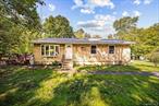 Updated two-bedroom ranch home that lives like a three-bedroom situated on 2/3 of an acre of level usable property boasting towering trees, just steps from the 129-acre White Pond which offers hiking trails, boat launch, non-motor boating, paddling, and fishing with multiple fishing piers. Features include a new roof, all new Anderson windows, a new slider to the large 24x14 deck, new laminate floors, new kitchen with stainless steel appliances and quartz counters, a new vanity and tile floor in the hall bath, and a primary bedroom with half bath and door to private 13x6 balcony. The basement is unfinished and contains the laundry area and oversized storage room. This lakeside community is the perfect place for a weekend retreat or full-time residence...come see for yourself!