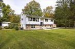 Spacious 4-bedroom, 2.5-bath raised ranch set on 2.4 acres in a quiet cul-de-sac. This home offers plenty of potential, with a generous front and backyardâ€”perfect for outdoor enjoyment, entertaining, or relaxation. Inside, the kitchen is equipped with appliances that are just 2 to 4 years old. The home is heated by oil baseboard, with propane-fueled stove and dryer for added convenience and efficiency. Located in a beautiful, established neighborhood, this property offers the best of both worlds: privacy and tranquility, while still being just minutes from shopping, the Taconic State Parkway, and the New Hamburg train stationâ€”ideal for commuters.