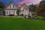 Welcome to 2 Pond Ridge Crossing, a beautifully appointed colonial in Newburgh that combines timeless design, modern comforts, and thoughtful upgrades. Set on a quiet private road, this residence offers the rare balance of privacy and convenience, with curb appeal enhanced by a commercial-grade stone retaining wall and landscaped approach.Step inside to over 3, 100 square feet of inviting living space, where hardwood floors and vaulted ceilings create a sense of scale and light. The formal living and dining areas are designed for gatherings, framed by oversized windows and recessed lighting. A chefâ€™s kitchen anchors the home with rich granite countertops, solid wood cabinetry, and a gas range, flowing seamlessly into the eat-in dining area and the family room with soaring ceilings and patio access. A flexible office with bay window and closet offers the option of a fifth bedroom, while a powder room and laundry with garage access complete the first floor.Upstairs, the primary suite is a retreat in itself, featuring a vaulted ceiling, French doors, generous walk-in closet, and a spa-inspired bath with a jetted soaking tub, double vanity, and recessed lighting. Three additional bedrooms provide comfort and versatilityâ€”one large enough for a king bed, one perfectly suited for a guest or childrenâ€™s room, and one ideal as a nursery or creative space. A full hall bath with tile and soaking tub serves these rooms with ease.The lower level expands the homeâ€™s possibilities. The full basement with 7.5-foot ceilings offers exceptional storage or finishing potential, with multiple half-grade windows that welcome natural light. A whole-house Generac generator ensures uninterrupted comfort, while a commercial-grade dual septic system, well water with filtration, and updated hot water tank provide peace of mind.Outdoors, an oversized bluestone patio with retaining wall sets the stage for entertaining or quiet evenings, while the attached two-car garage offers storage and workspace. With simple updatesâ€”such as repainting the garage, refreshing cabinetry, or pressure-washing sidingâ€”the property is move-in ready yet still full of opportunity for personalization.Additional highlights include dual-zone central air conditioning, a security system with cameras, and an irrigation system for front and side lawns. The attic is clean and dry, housing both AC units with proper drip pans and insulation. From the robust systems to the thoughtful finishes, every detail supports long-term ease of ownership.Situated minutes from shopping, dining, and commuter routes, yet tucked away on a peaceful hilltop setting, 2 Pond Ridge Crossing offers a lifestyle of comfort, privacy, and convenience. Whether hosting gatherings, enjoying quiet nights by the fireplace, or simply appreciating the reliability of a home built to last, this residence is ready to meet the needs of todayâ€™s buyer.Call Ryan today at 845-867-2450.