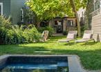 A jewel box in Hudson. Just a few blocks from Warren Street lies 342 State. With a private, lush backyard & an in-ground heated pool, this property bridges the gap between in-town living and a country getaway. Inside youâ€™ll find a completely turn-key setup, with fabulous original floorboards & high end finishes. The kitchen is the heart of the home, the built-in banquette overlooks the yard through French doors, and youâ€™ll find Danby marble countertops and DeVOL hardware. The living room features a Mendota gas fireplace set in a custom brick hearth and finished in Portola lime wash, wonderfully cozy on a Fall eve. The guest room/office sits at the back of the house on the first floor with a gorgeous walnut built-in desk. Youâ€™ll find a new full bath fitted in Carrara marble and Waterworks hardware and a new laundry room with custom cabinetry. The open stairwell features a George Nelson/Herman Miller Cigar Bubble pendant and takes you up to the primary suite which spans the entire second floor, offering a full bath, study & custom built-ins. Outside, the concrete heated pool is a game changer for in-town living. Youâ€™ll find bluestone coping, a new patio & privacy fencing. All just a few minutes walk to the fabulous restaurants and shops that the Hudson Valleyâ€™s favorite rivertown has to offer, and 5m to Amtrak for easy access to the city.