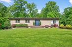 A Right on Robin Hood! This beautifully updated ranch offers the perfect blend of modern updates and cozy charm. Featuring 3 bedrooms, 2.5 bathrooms, AND nestled on .88 of an acre, this is the home you&rsquo;ve been dreaming of. Step inside to discover an open-concept layout that invites both comfortable living and effortless entertaining. The gourmet kitchen boasts stainless steel appliances, quartz countertops, and timeless finishes that exude both elegance and durability. Whether you&rsquo;re relaxing in the bright living space or cooking up a meal in the heart of the home, you&rsquo;ll feel the serenity and style that sets this home apart. Step outside onto the Trex deck and take in the beautiful backyardâ€”perfect for morning coffee, weekend gatherings, or simply enjoying the peaceful setting.. Be sure to check out the full walkout basementâ€”a versatile space ready for your finishing touches! 103 Robin Hood is ready to welcome you home.