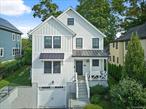 Enjoy contemporary living in historic Pelham with this nearly-new (2020), impeccably-maintained home. Impossible-to-find open floor plan flows seamlessly from the airy foyer into a living and dining area, fantastic kitchen, and family space with glass fireplace and sliding door to bluestone patio and yard. At the heart of it all, an inviting kitchen island with quartz counter draws family and friends together with seating on two sides. Brand new kitchen appliances include Bosch refrigerator, dishwasher, and induction range. Second floor master bedroom with luxurious bath plus three additional generously-sized bedrooms, hall bath, and custom closets throughout. Over 2000 square feet plus an additional 800 square feet in walk-out basement with nine-foot ceilings, huge family rec space, laundry room with LG front-loading washer and dryer, and mudroom. Built to be eco-friendly, this home has an electric car charger, is spray foam insulated, and features a high-efficiency, low-cost, electric HVAC system with ERV (energy recovery ventilator) designed for both comfort and climate friendliness. Situated in the heart of Pelham, within easy walk of Pelham Metro-North train station, new (2023) Hutchinson Elementary School, and downtown shops and restaurants.