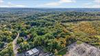 Bring your vision to life on this rare 4.11-acre flat, wooded lot tucked in a sought-after Mahopac location.This unique offering goes beyond the acreage itselfâ€”the sale includes Anna Lane (a private road), the drive road Green Acres, and a portion of Young Avenue up to Lot 12, expanding the usable footprint and potential. Picture the possibilities: design a custom dream home, create a private weekend escape, or hold as a smart long-term investment. Just one minute from the Taconic Parkway and close to shopping, schools, and everyday conveniences, this parcel offers a rare opportunity to design and build the future youâ€™ve been waiting for.