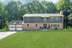 Tucked away on a quiet cul-de-sac in the picturesque town of Katonah, this beautifully updated five-bedroom, four-bath home sits on over an acre and offers more than 3, 000 sq ft of open-concept livingâ€”perfect for entertaining or everyday comfort. Step into the foyer beneath a grand chandelier and into the heart of the home. The chefâ€™s kitchen is a delight, with an oversized quartz waterfall island, seating, a second sink, microwave, beverage fridge; and all-new Thermador appliances, including a pot filler to cook with ease. Ample cabinetry and a walk-in pantry keep everything organized, and just beyond is the dining area with wood-burning fireplace, which brings warmth and charm. Relax and unwind in the living room, complete with oversized windows and French sliding door leading to the backyard the newly built bluestone patio (September 2025), allowing easy access to the backyard for effortless indoor-outdoor living. The generous windows throughout the house allow the natural light to stream in and create a bright and airy feel. Additionally, a first-floor bedroom and full bath provide ideal accommodations for guests or an au pair. Upstairs, convenience meets luxury with a second-floor laundry room, four additional bedrooms and three full bathrooms. The sprawling primary suite is a true retreat, complete with a walk-in closet, a luxurious en-suite featuring a double vanity, a classic clawfoot tub, separate shower, and direct access to a private deck. A second bedroom also has an en-suite bathroom and walk-in closet, and there are two additional bedrooms on the second floor. Peace of mind comes with extensive updates: a new Camelot roof, windows, siding, plumbing, electrical, well system, and efficient Bosch heat pumps with propane backup. With a two-car garage, expansive yard, and tranquil tree-lined setting, this turn-key Katonah gem is ready to welcome you home.