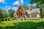Once upon a time, a visionary builder poured his passion into creating not just a houseâ€”but his kind of castle. With meticulous care, he selected every material, every craftsman, and personally oversaw each detail. The result? A stately, timeless residence that stands as both a dream fulfilled and a legacy preserved. Come and See how Amazing and Beautiful this one of a kind home truly is. Both the Home and The Garage have Five Colors of Vermont Slate Roofing Tiles, that will stand the test of time.The Feeling as you Enter through the Sturdy European Double doors, then the walk through to the Living Room, Dining Room, Kitchen & Sunroom takes your breath away,  your eyes can&rsquo;t absorb all they are seeing. The Primary Bedroom En-Suite is a Sanctuary with Stately Bathroom with Soaking Tub, Separate Shower, Walk In Linen Closet, 1st Floor Laundry and Juliet Balcony. The Center Island Kitchen is the Heart of this Home and has Top Shelf Appliances, including a Bertazzoni Stove/Oven, Sub Zero Frig, Cabinetry Galore and Counterspace that will awe any Chef. The Dining Room and Living Room focus is the Floor to Ceiling Wood-burning Stone Fireplace, hand crafted by a 3rd Generation European Stone Mason, .....Santa will be proud to slide down that Chimney and fill all the Stockings hung there during the Holidays. Sunlight spills into the bright sunroom, the perfect spot for morning coffee, a good book, or a recharge on gray winter days. The Lower Level is Ground Level and has 3 more bedrooms and a full bathroom, & storage areas. There is also a Dressing room, that captures the Essence of a High-End Boutique, creating a one of a kind space for your Personal Clothes Collection! This level is a private and has a separate entry opening the possibility for a Multi Generational living space, or a Haven for Teenagers. The Mechanical Room will Impress even the most Tech Savvy......Radiant Heat, Specialty Boiler, Water Heaters and Systems that the Owner will give Tutorials on. The 3 car Garage Has A Professional Lift, Making it the perfect Haven for Car Enthusiasts and Collectors alike. Over the Top with Details and Unique Building Materials........This Homestead proudly sits on 1.9 Acres. It is Sooooo Magical & Special and Will Excite your Heart and Soul !!!! What was a once a Dream and Now is a Reality, that took a very Special Man Years to Skillfully Orchestrate, is just to know this Multi Faceted Man and See & Feel the Legacy he Created!!!!