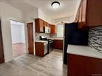 Renovated 3-bedroom apartment in the heart of Upper Glendale NY! Offering a bright, open living and dining area, this spacious apartment features a modern kitchen with sleek stainless steel appliances, granite countertops, and plenty of cabinet space, all set on elegant hardwood floors , washer and dryer. Perfectly located near Trader Joe&rsquo;s, Atlas Park Mall, Forest Park, restaurants, and banks, you&rsquo;ll have quick access to the Expressway, JFK & LGA Airports, and public transportation (M/L trains, Q55, Q29, QM24 buses), making your commute to Manhattan. With schools, shops, gyms, and more nearby, this apartment truly has it all. Water is included, with tenants responsible for electric and gas. Don&rsquo;t miss out-schedule your showing today and make this stunning apartment your new home!