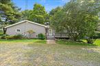 Welcome to this 3-bedroom, 1-bath ranch nestled on 1.4 peaceful acres, offering both privacy and opportunity. With its single-level living, this home is a great fit for first-time buyers, downsizers, or anyone ready to put their personal touch on a property with solid bones. Inside, youâ€™ll find an inviting layout ready for updatesâ€”walls, ceilings, and flooring await your vision to transform this home into something truly special. Step outside and enjoy the 24x24 barn/workshop, perfect for hobbies, storage, or a home-based business. The expansive yard and front and back decks provide plenty of space for gardening, entertaining, or simply relaxing in a quiet country setting. If youâ€™re looking for a starter home with character, this is the one. Bring your creativity and make it yours!