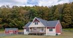 Country Contemporary on 12 Acres â€“ Turn-Key and ReadySet on 12 private acres just minutes from Roscoe, Callicoon, and Jeffersonville, this beautiful 5-bedroom, 3.5-bath country contemporary strikes the perfect balance of style, comfort, and space. Originally built in 2017 and thoughtfully updated by its current owners, the home has been elevated to a new level of modern country living.Step inside to a bright, open floor plan with soaring ceilings, walls of windows, and an inviting sense of togetherness. The chef-friendly kitchen features granite countertops, cherry wood cabinetry, stainless steel appliances, a propane cooktop, and a raised oven for baking convenience. Wood floors and pendant lighting bring warmth and elegance to the relaxed eat-in space.Upstairs, a balcony overlooks the great room, offering cozy reading nooks and seating areas that frame the views. The primary suite includes a private office, while four additional bedrooms provide plenty of space for family and guests.The finished lower level is designed for both fun and functionality, with a media area, pool table, workout zone, bathroom and a separate workshop. A pellet stove adds cozy comfort, while dual hot water systems and an efficient propane furnace keep the home running smoothly.Enjoy the outdoors in every season: sip coffee on the front porch, gather for meals on the back deck, or unwind in the hot tub under the stars. The large fenced yard is perfect for kids and pets, while the sunny acreage offers room for gardens, landscaping, or even a pool. Convenient walk up balcony doors make outdoor access easy.2 hours to NYC via 17/86 easy on easy off.