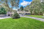 Set on a sprawling 0.95-acre lot, this beautifully maintained 3-bedroom, 2-bathroom ranch offers privacy, comfort, and open-concept living in a serene East End setting. Inside, youâ€™ll find gleaming hardwood floors throughout, a spacious living and dining area, and a modern kitchen featuring stainless steel appliances, gas cooking, granite countertops, and soft-close cabinetry.The primary bathroom is a retreat with sleek, contemporary finishes, dual rain showers, and heated floors. The second bathroom is equally inviting, showcasing an updated design and a relaxing jacuzzi tub. All three bedrooms are generously sized and bathed in natural light.A full, unfinished basement offers endless potentialâ€”perfect for storage, a home gym, or future living space.Step outside to your entertainerâ€™s dream backyard with plenty of room to customize, expand, or simply enjoy the peace and quiet. The expansive property provides space for a pool, garden, or what your vision may be. Additional features include a detached two-car garage, a six-zone sprinkler system, and central air conditioning for year-round comfort.This is your opportunity to own a move-in-ready home on nearly an acreâ€”where privacy and style meet.