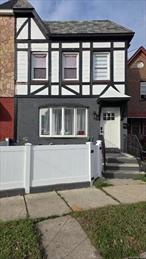 Welcome to 112-10 Colfax Street, where space, style, and modern comfort meet in the heart of Queens Village! This move-in-ready single-family brick townhouse is the only home on the block with its own designated rear parking spotâ€”a true rarity in the neighborhood.Step inside to a sun-drenched, open-concept living and dining area designed for entertaining. The chefâ€™s kitchen showcases floor-to-ceiling custom cabinetry, sleek granite countertops, a full suite of stainless steel appliances, and an island with bar-stool seating. Upstairs youâ€™ll find three spacious bedrooms with ample closets, and a fully tiled bath with designer finishes.The high-ceiling finished basementâ€”complete with a full bathroom, interior and exterior accessâ€”adds tremendous versatility. Whether as a guest suite, home office, gym, or in-law setup, the possibilities are endless.Modern upgrades throughout include ductless heating & cooling for year-round comfort and energy savings, hardwood floors, recessed lighting, updated plumbing, electrical, and more.Perfectly positioned, this home sits moments from JFK International Airport, major highways, and the Long Island Rail Roadâ€”making commuting and travel effortless. Enjoy the charm of tree-lined streets while being just steps from schools, parks, shopping, dining, and all that Queens Village has to offer.Donâ€™t miss your chance to own this rare gem with private parking and a finished basementâ€”come experience the Queens Village vibe today!